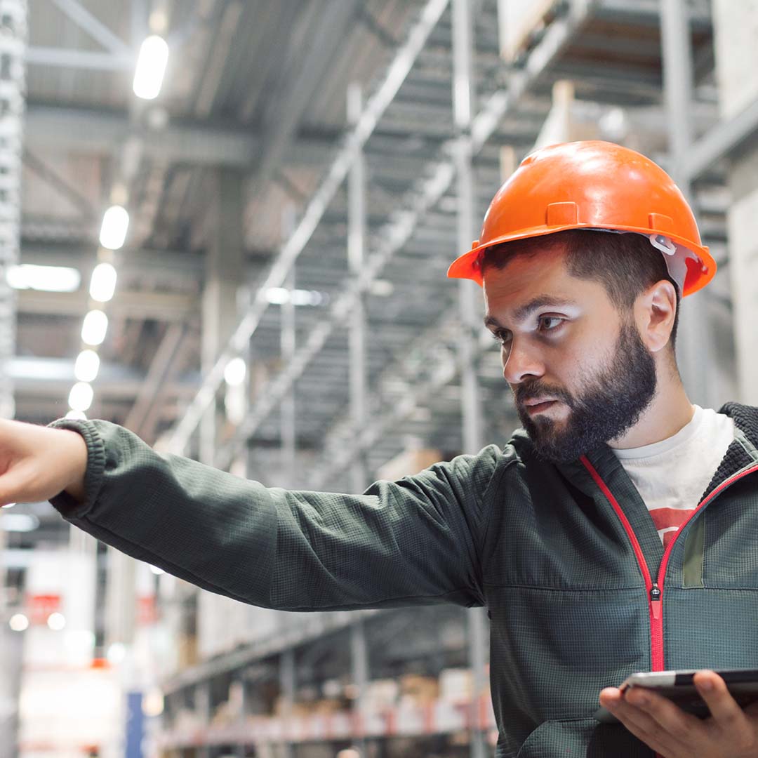 1080x1080Social-2 man in warehouse conducting inventory