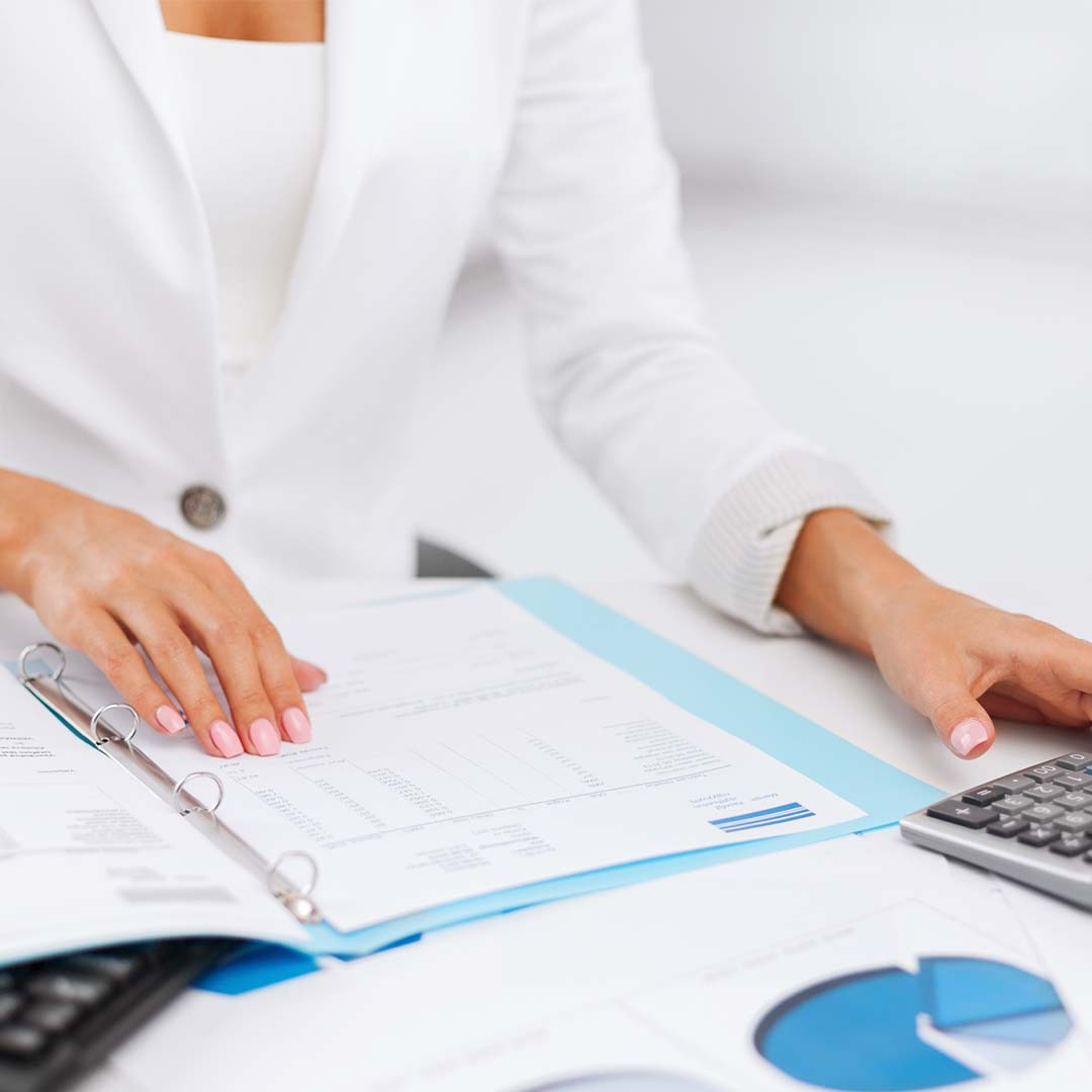 1080x1080Social-3 woman looking at business plan